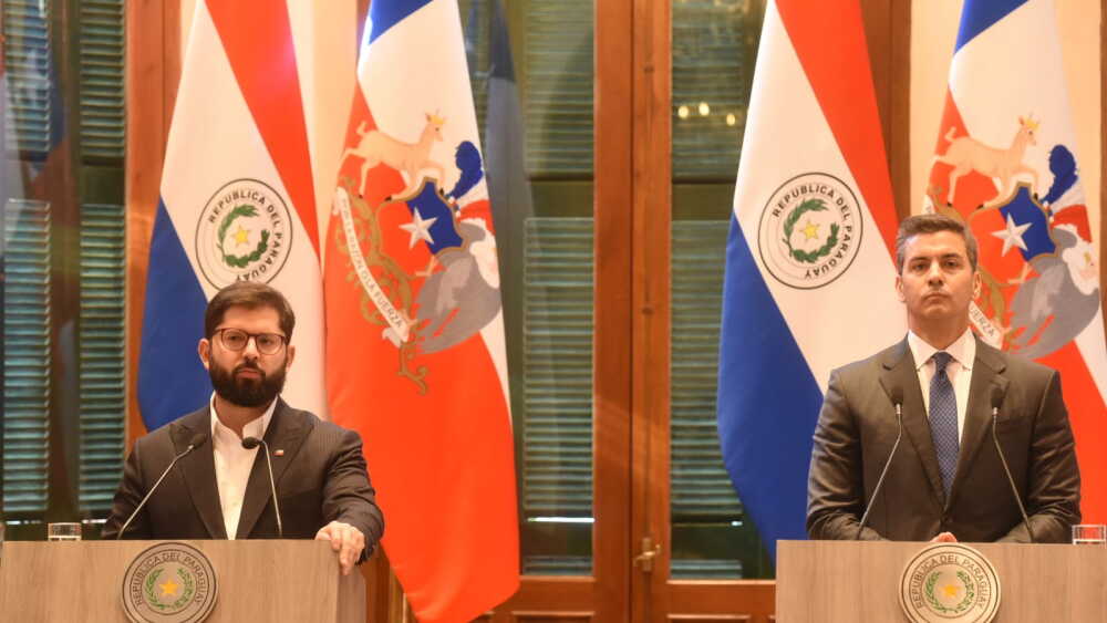Gabriel Boric y Sanitago Peña