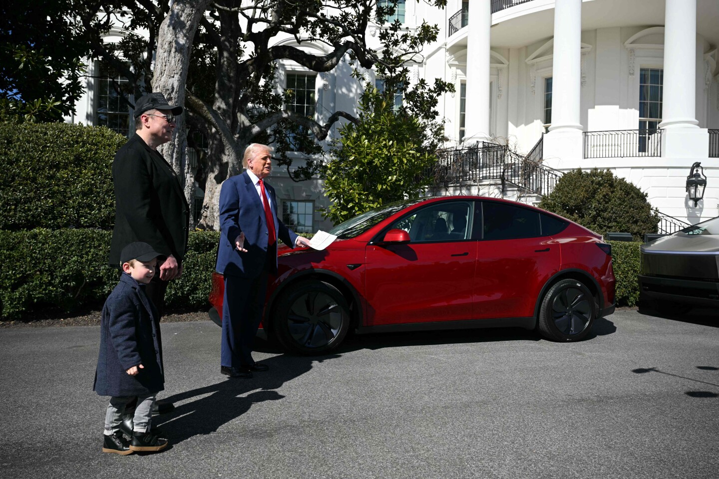 US President Trump unveils a Tesla car at the White House