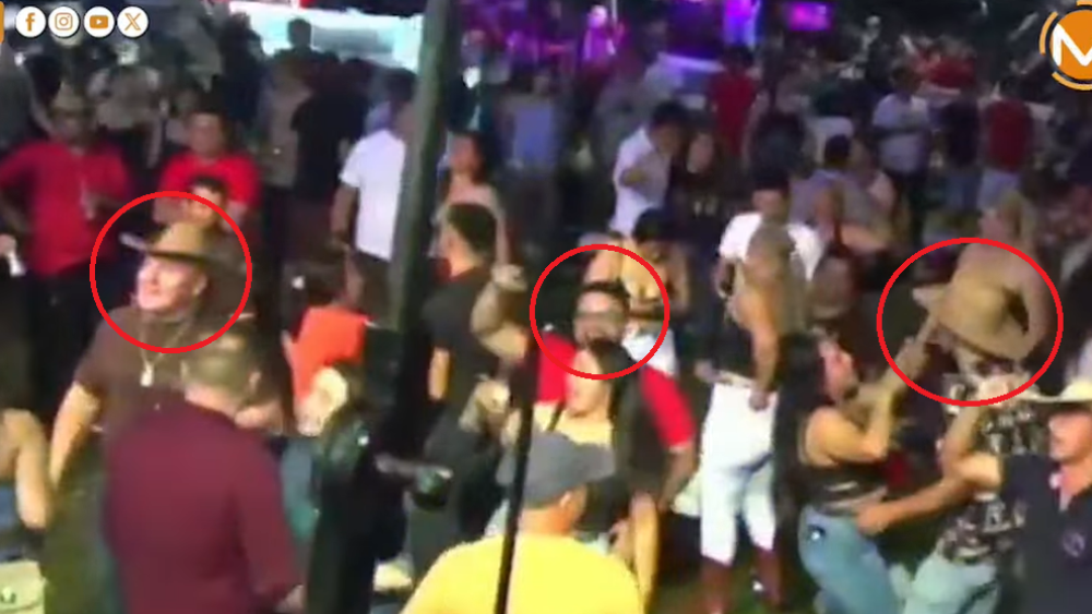 Hombres que acompañaban a las mujeres en la jineteada.png